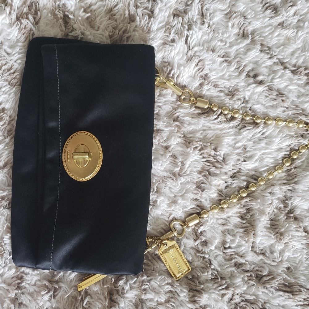 Coach Black and Gold clutch